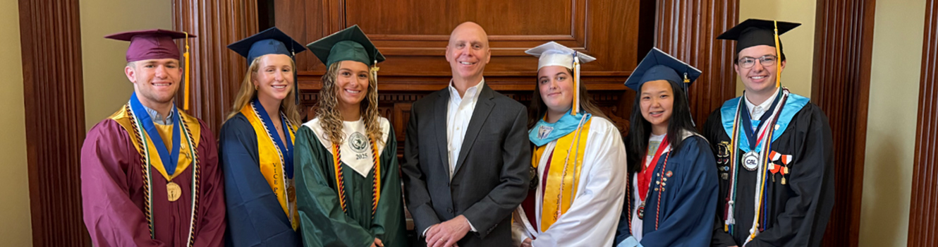 2025 IFS student scholarship winners with President & CEO Michael Jones